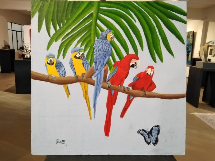 Guacamayas y Mariposa Azul