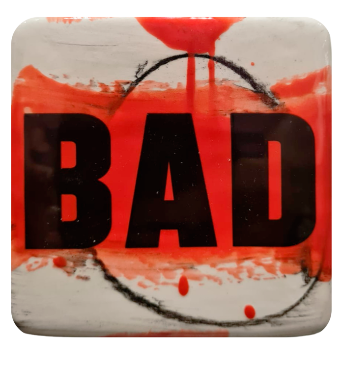 Cube red and white with bad letters in black