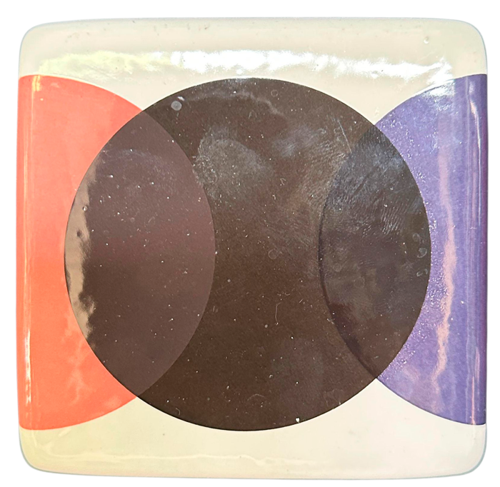 Cube with black, pink and purple circles